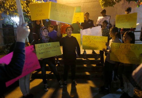 Students from the Magnolia Science Academy rally outside the Santa Clara Unified School District Board Meeting, March 5, 2015. Magnolia hopes to get an extension for its lease so that they can find a permanent facility. ) (Nhat V. Meyer/Bay Area News Group)